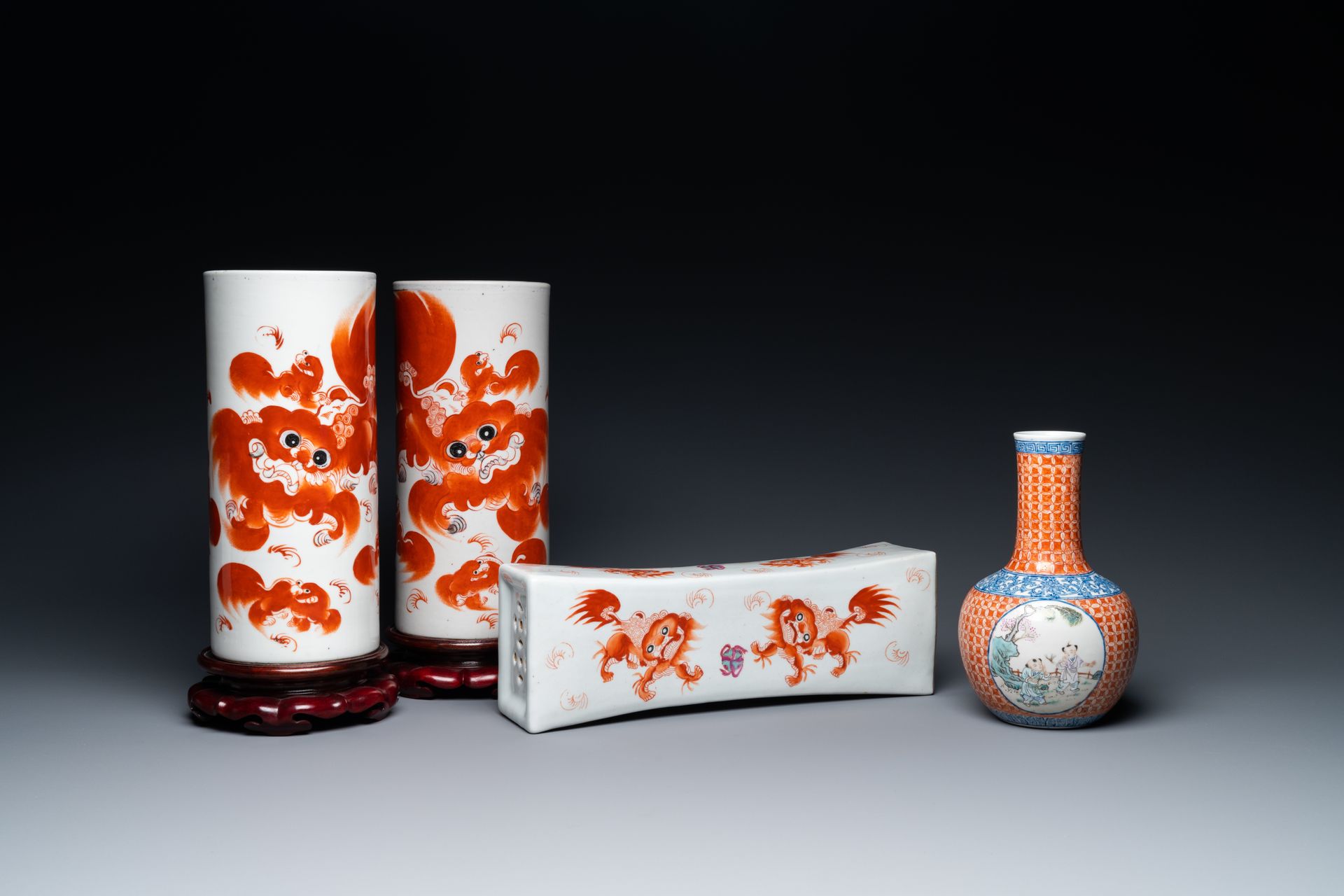 A Chinese famille rose 'playing boys' vase, a pair of hat stands and a head rest&hellip;