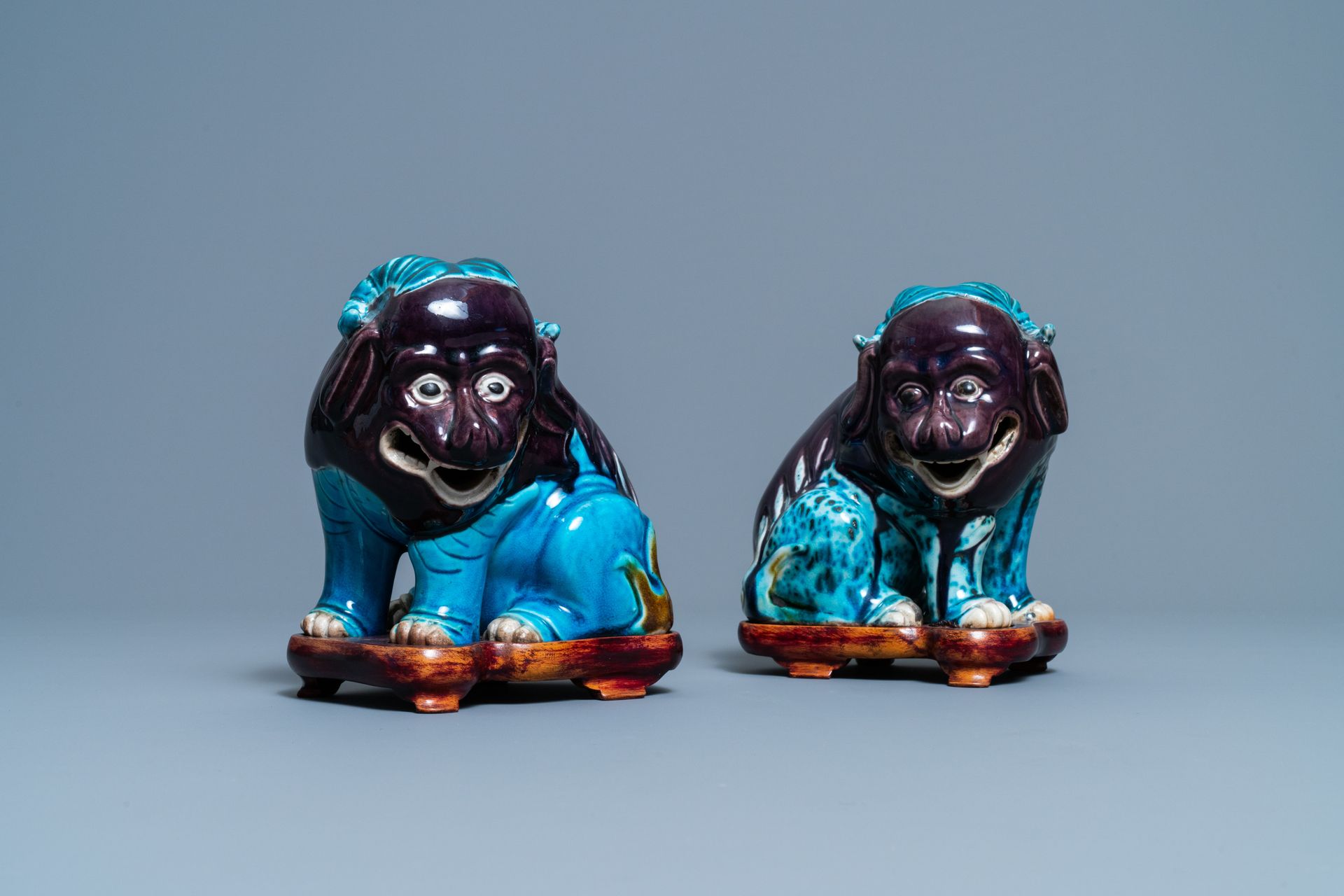 A pair of Chinese turquoise- and aubergine-glazed models of mythical animals, 19&hellip;
