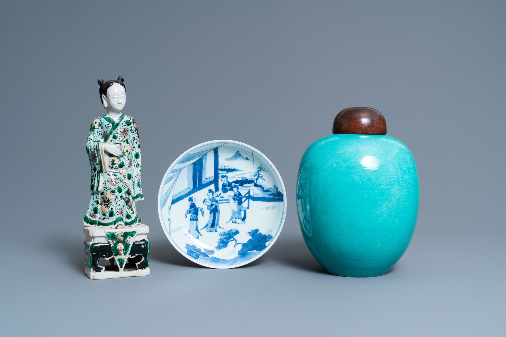 A Chinese verte biscuit figure, a green 'lotus' jar and a figurative blue and wh&hellip;
