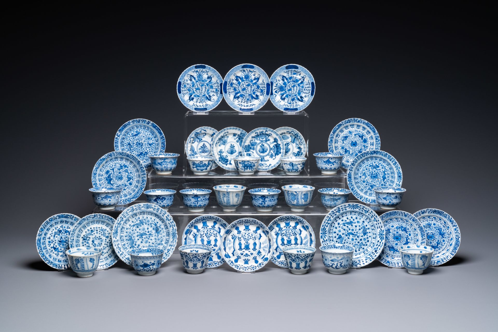Twenty Chinese blue and white saucers and nineteen cups, Kangxi and later Titolo&hellip;