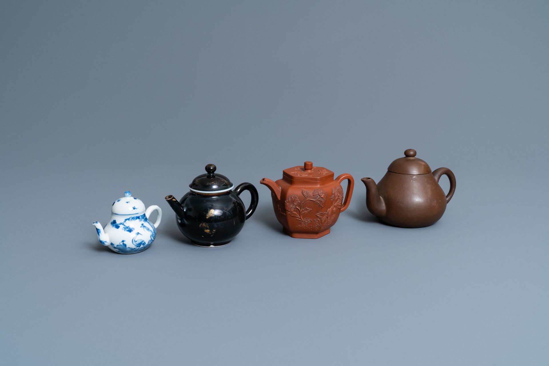 Four Chinese Yixing stoneware, blue and white and monochrome black porcelain tea&hellip;