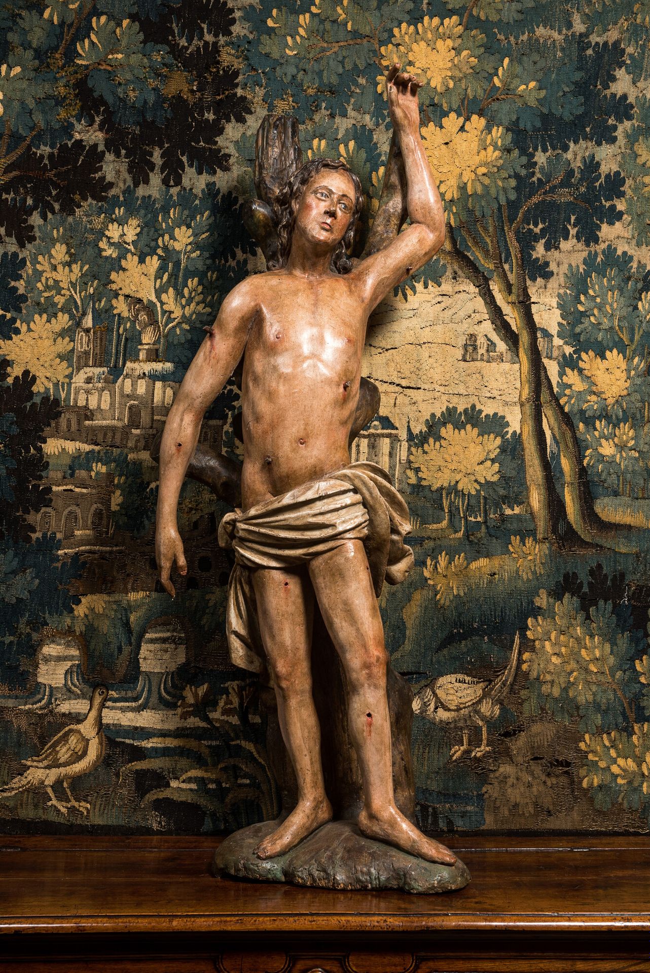 A large German polychrome wooden sculpture of Saint Sebastian, 16h C. Full title&hellip;