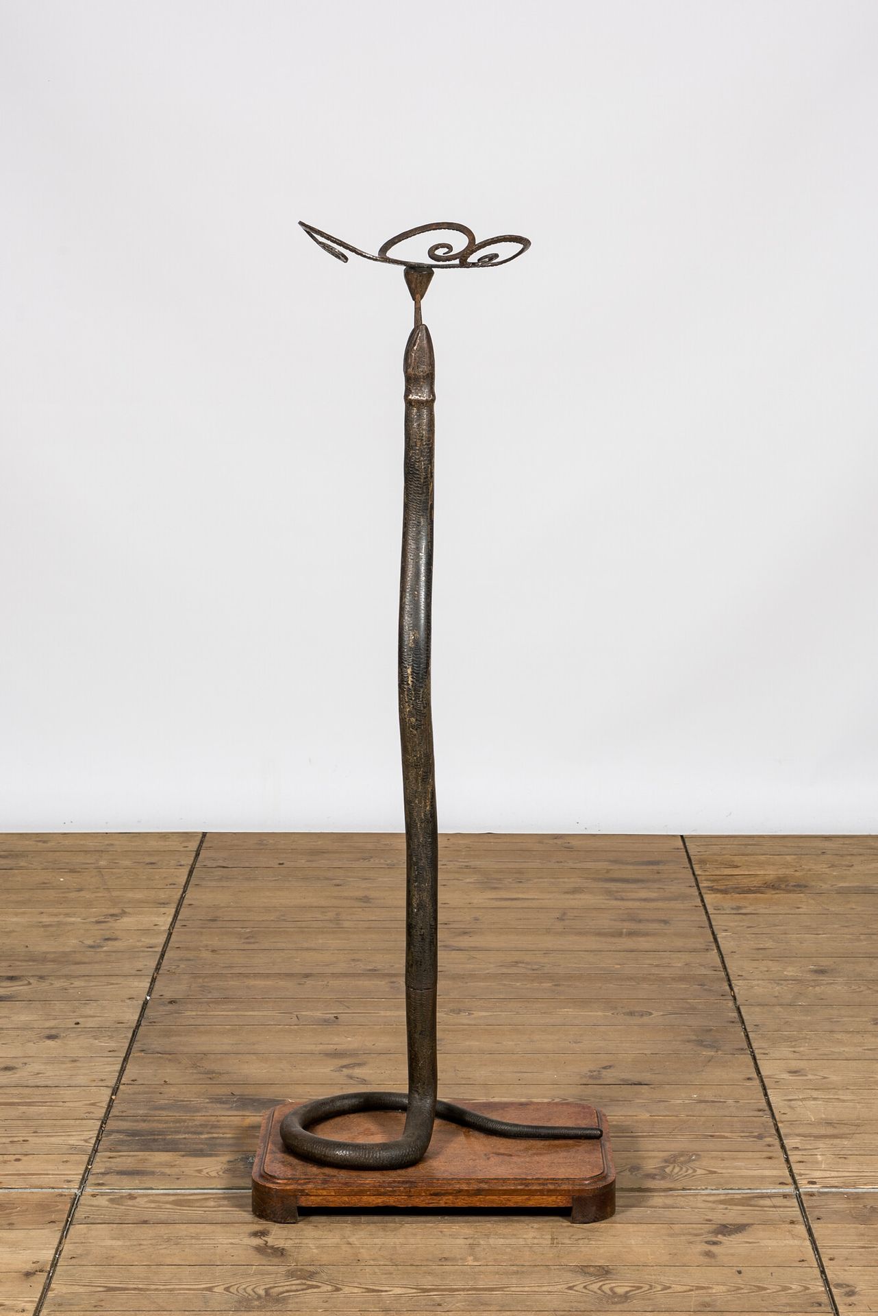 A patinated bronze floor lamp in the shape of a snake, 1st half 20th C. Full tit&hellip;