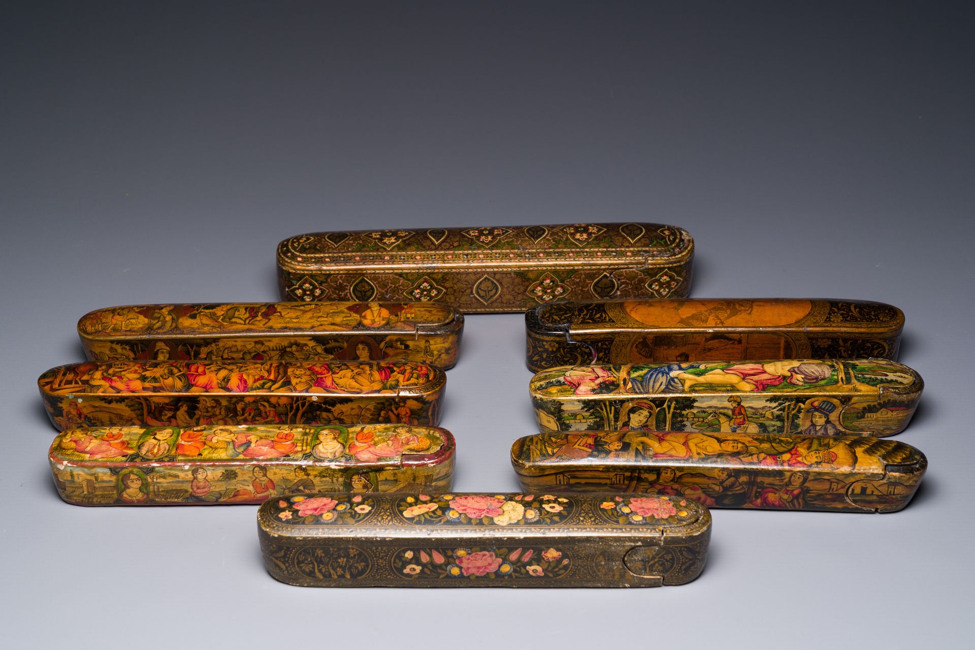 A collection of eight lacquered papier-mache pen boxes or qalamdans, Qajar, Pers&hellip;
