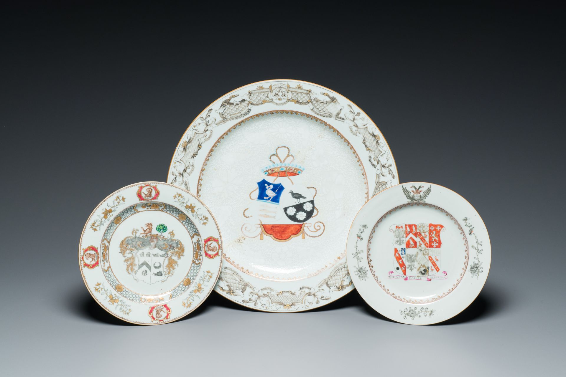 A Chinese grisaille armorial dish and two plates for the Dutch, English and Scot&hellip;