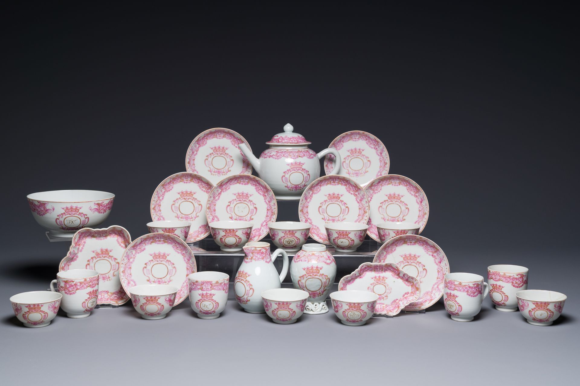 A 28-piece Chinese puce-enamelled and gilt armorial tea service with crowned mon&hellip;