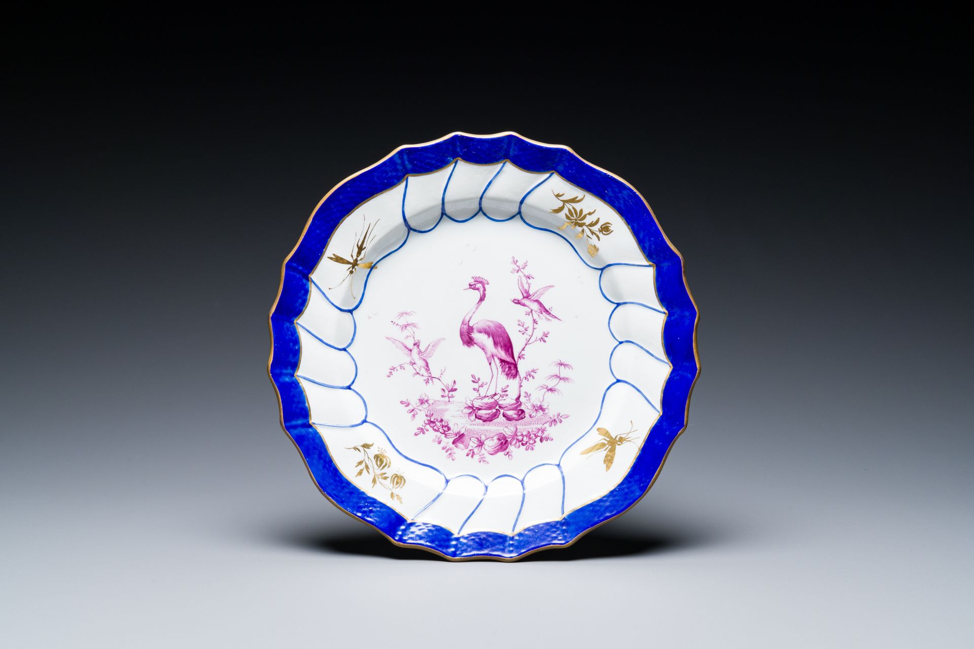A gilt puce-enamelled 'birds' plate with a blue-enamelled border, Tournai, 18th &hellip;