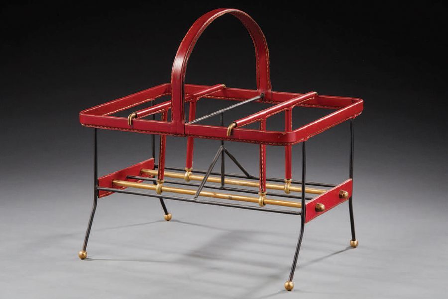 JACQUES ADNET (1900-1984) 
Magazine rack with metal structure partly covered wit&hellip;