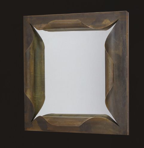 Paul LEGEARD, attribué à 
Miroir à encadrement en métal courbé enserrant une gla&hellip;