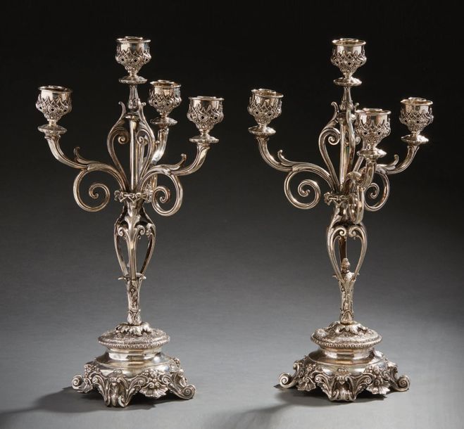 Null Pair of four-light candelabra in silver, the base resting on four winding l&hellip;