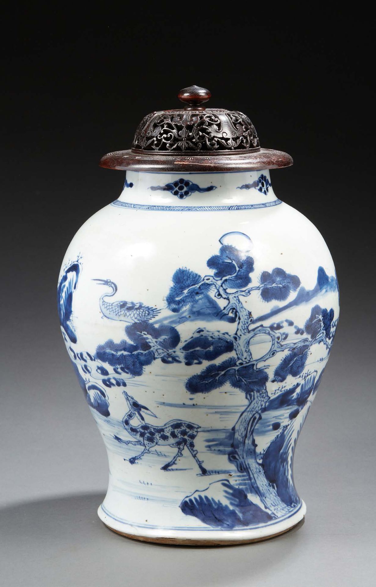 CHINE A baluster-shaped porcelain vase decorated in blue underglaze with two dee&hellip;