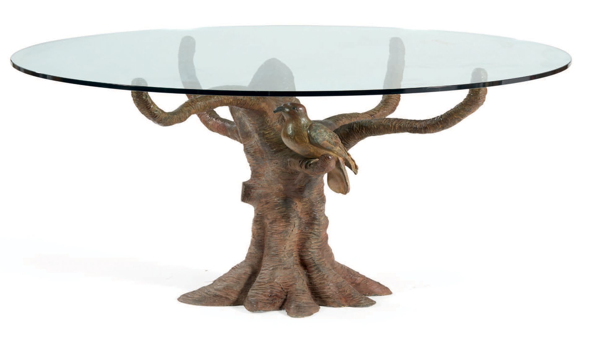 ENZO MISSONI (XXE) 
餐厅桌子，圆形玻璃桌面放在一个青铜底座上，上面装饰着树枝、鸟和巢
高：75 直径：120厘米