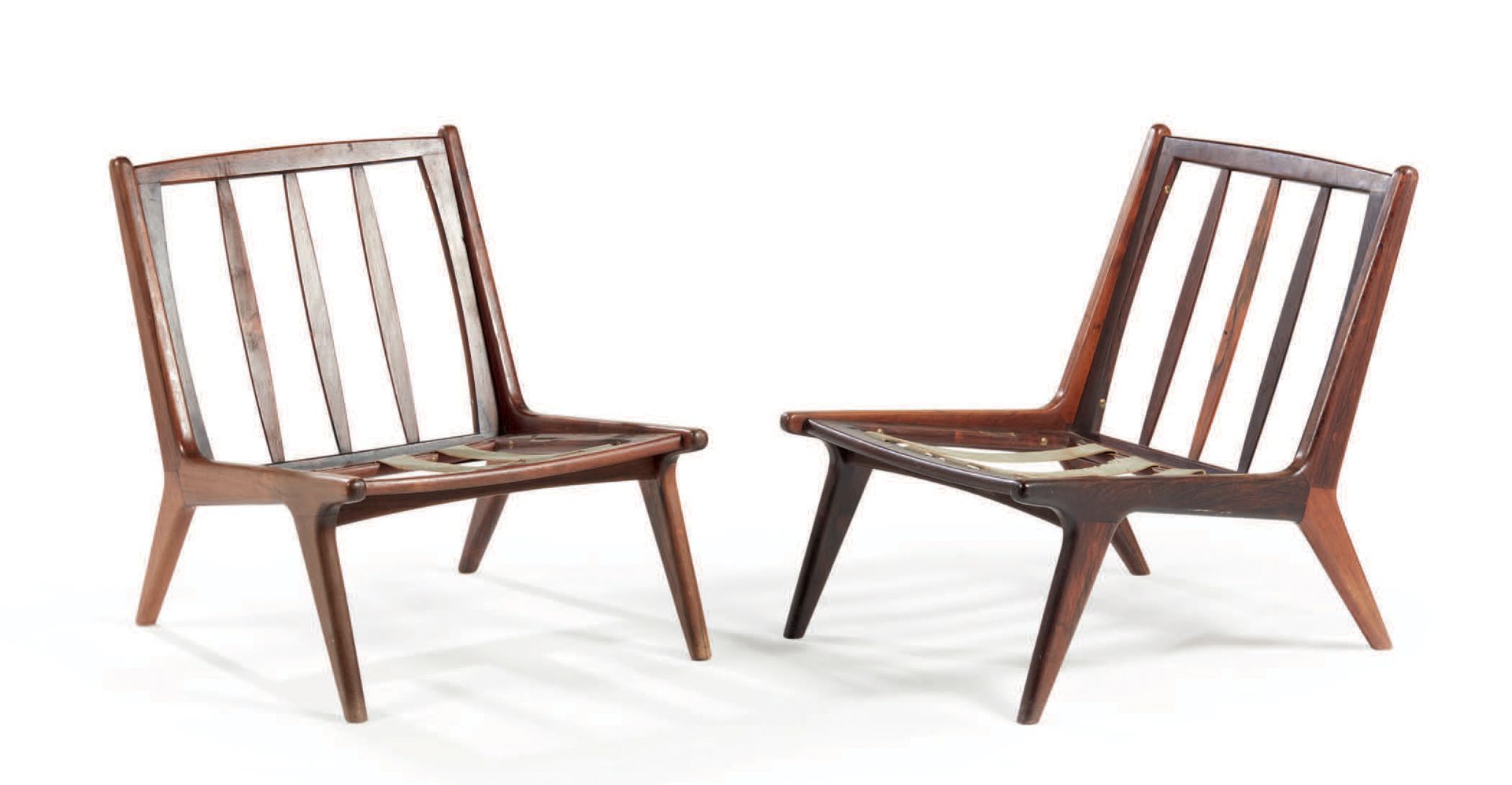 TRAVAIL DANOIS Pair of rosewood armchairs with openwork slats and profiled legs
&hellip;