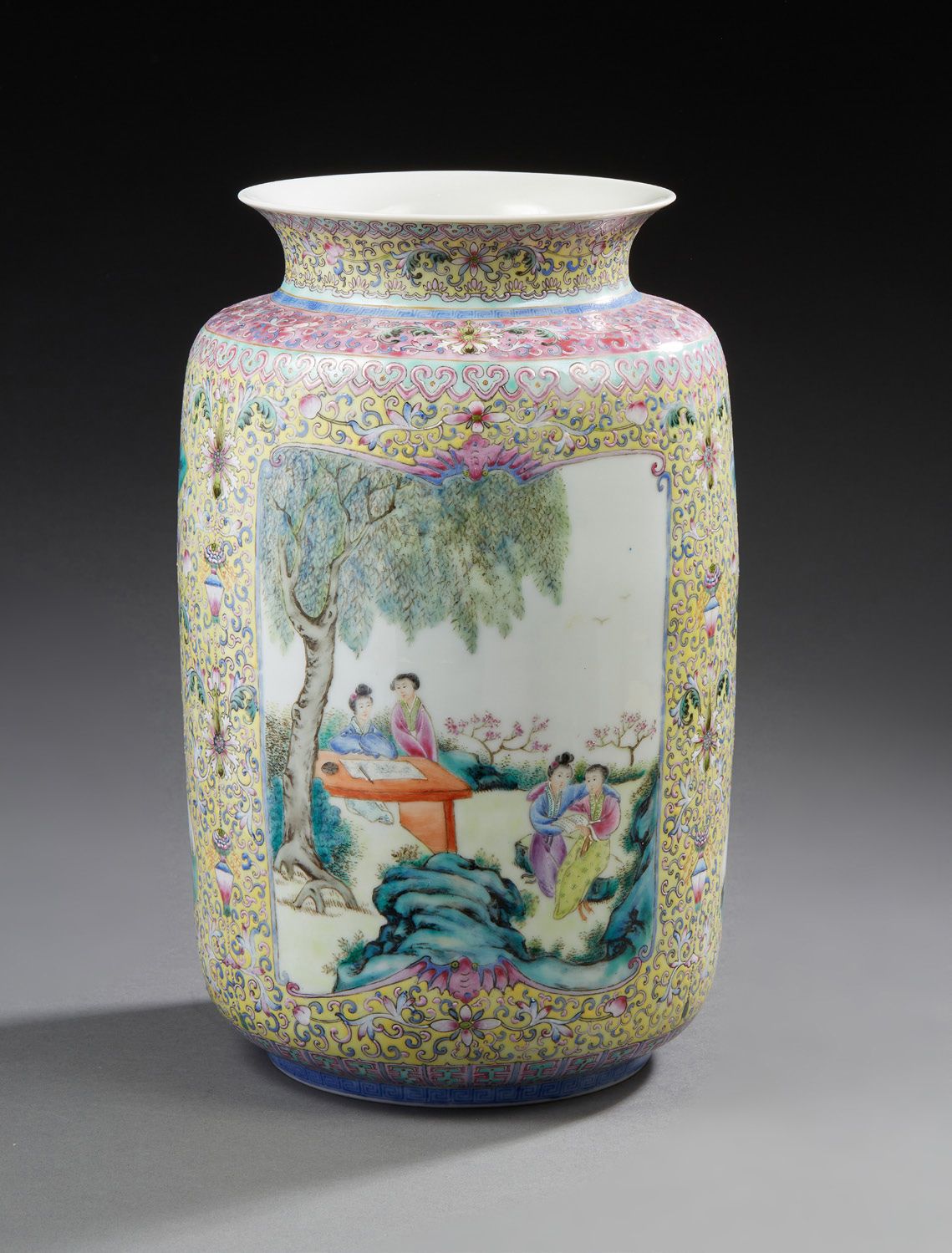 CHINE A cylindrical porcelain vase decorated in famille rose enamels with two wo&hellip;