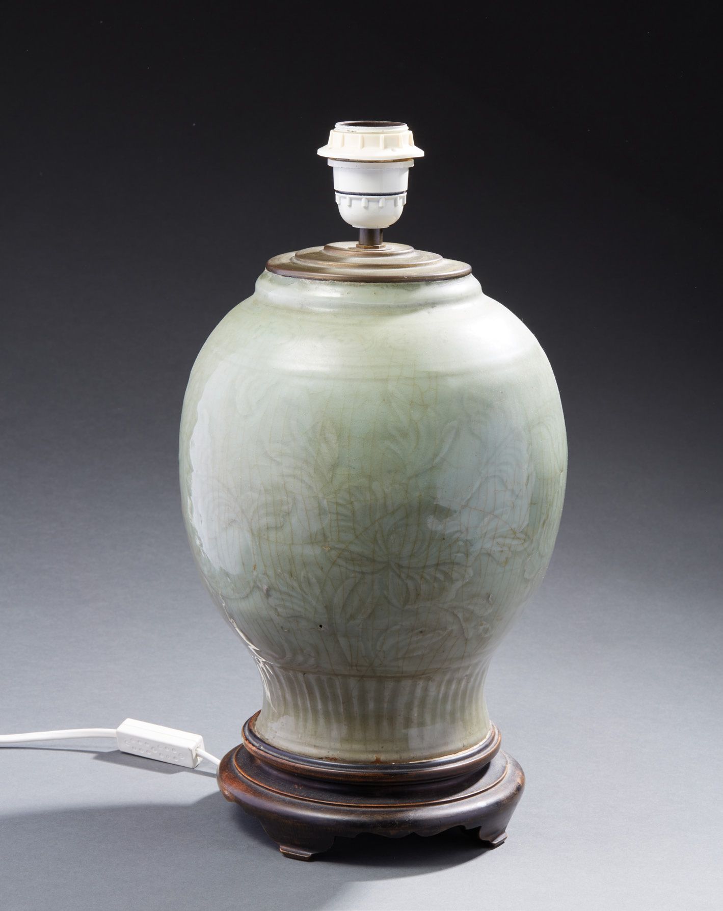CHINE Porcelain stoneware baluster vase with green celadon glaze and incised flo&hellip;
