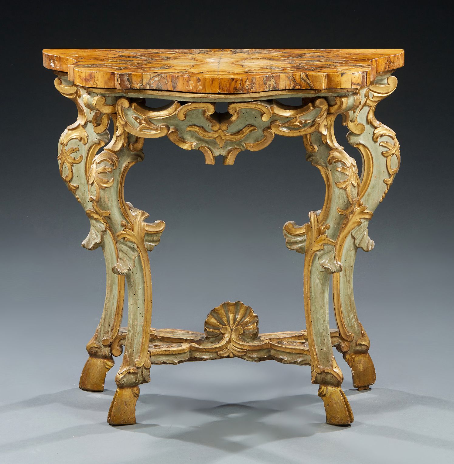 Null A carved and gilded wood CONSOLE with pale green rechambering; the aprons a&hellip;
