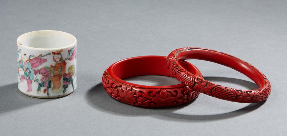 CHINE Two bracelets in red cinnabar lacquer carved with flowers Diameter: 8 cm a&hellip;