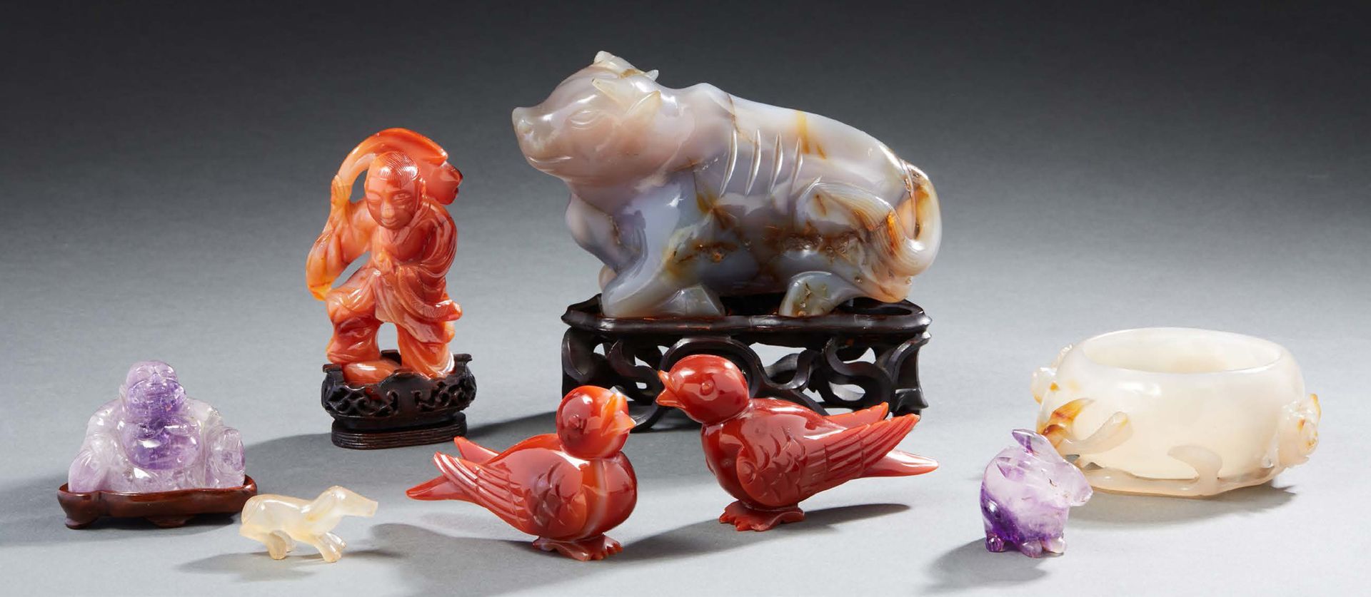 CHINE Set of carved stones including a lying ox in agate (wooden base), a Buddha&hellip;