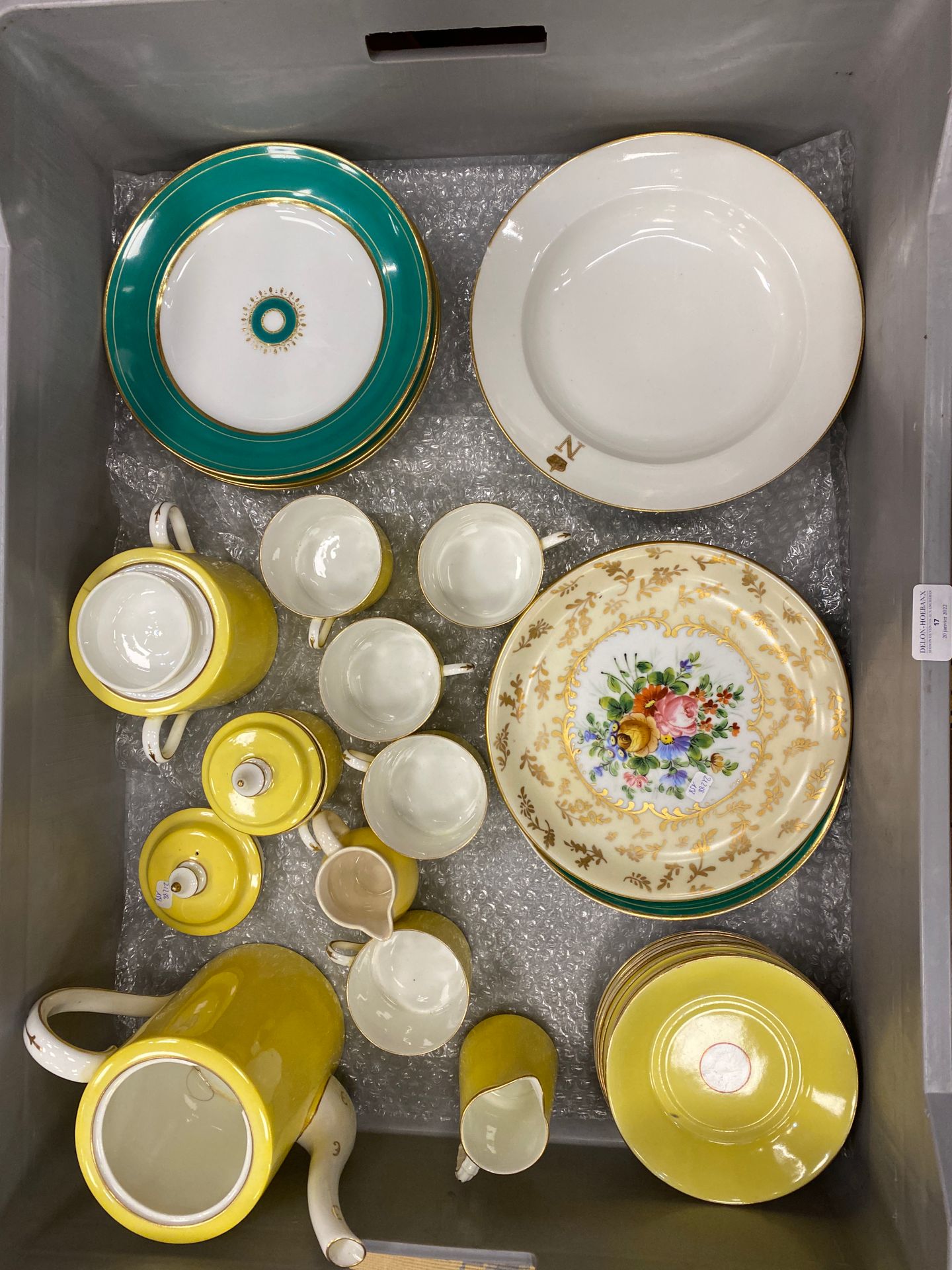 Null Set of various decorative porcelain plates and a yellow porcelain tea set