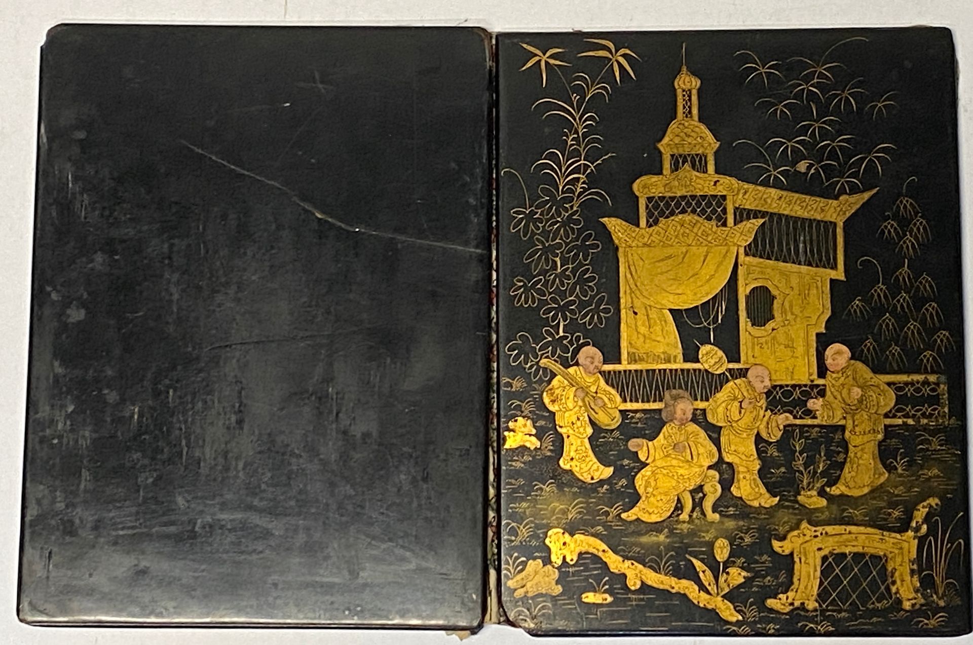 Null Lacquered wood binding with gilded decoration of Chinese and a pagoda.

Acc&hellip;