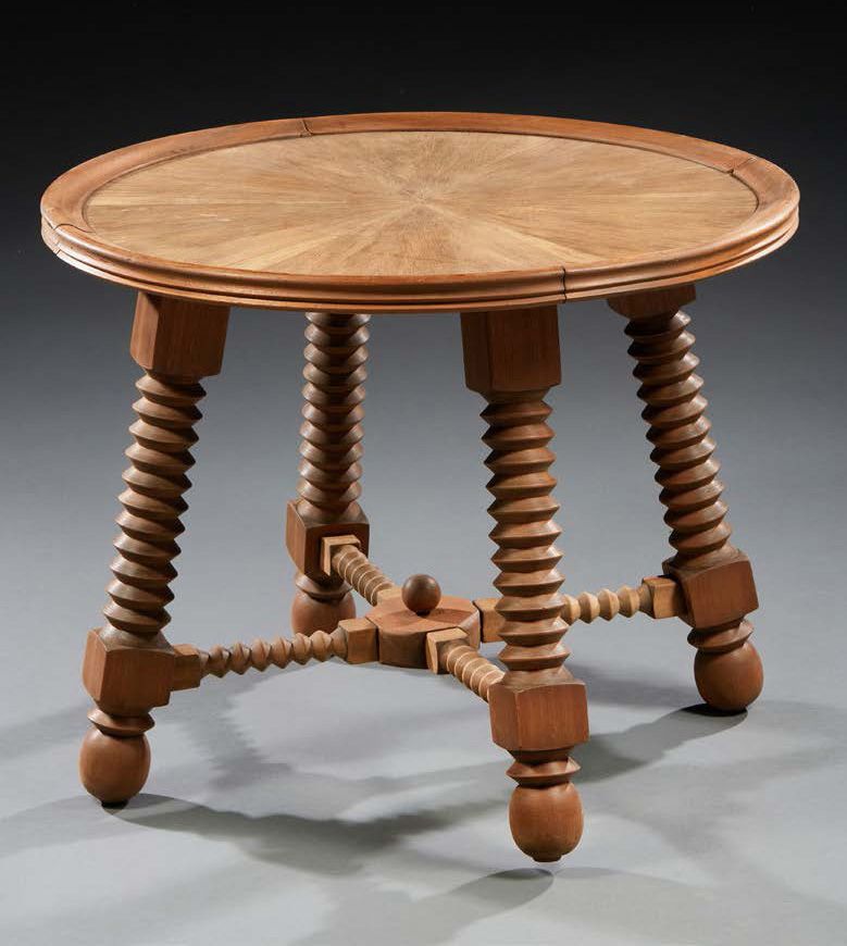 Charles DUDOUYT Pedestal table in natural wood resting on four turned legs.
H. :&hellip;