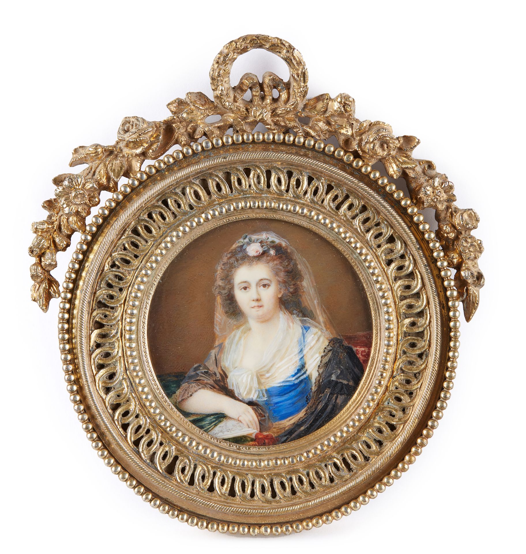 Null 18世纪法国学校

一个女人的画像

玻璃下的圆形水彩画小品。

直径：6.8厘米。

在一个美丽的鎏金铜框中。