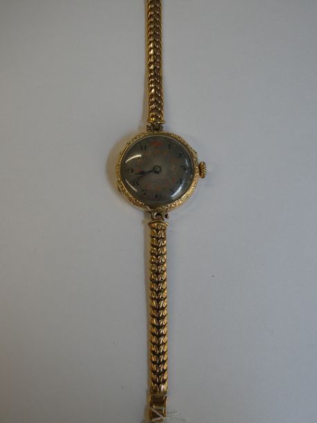 Null Montre bracelet de dame en or jaune 18K (750) cadran rond à chiffres romain&hellip;
