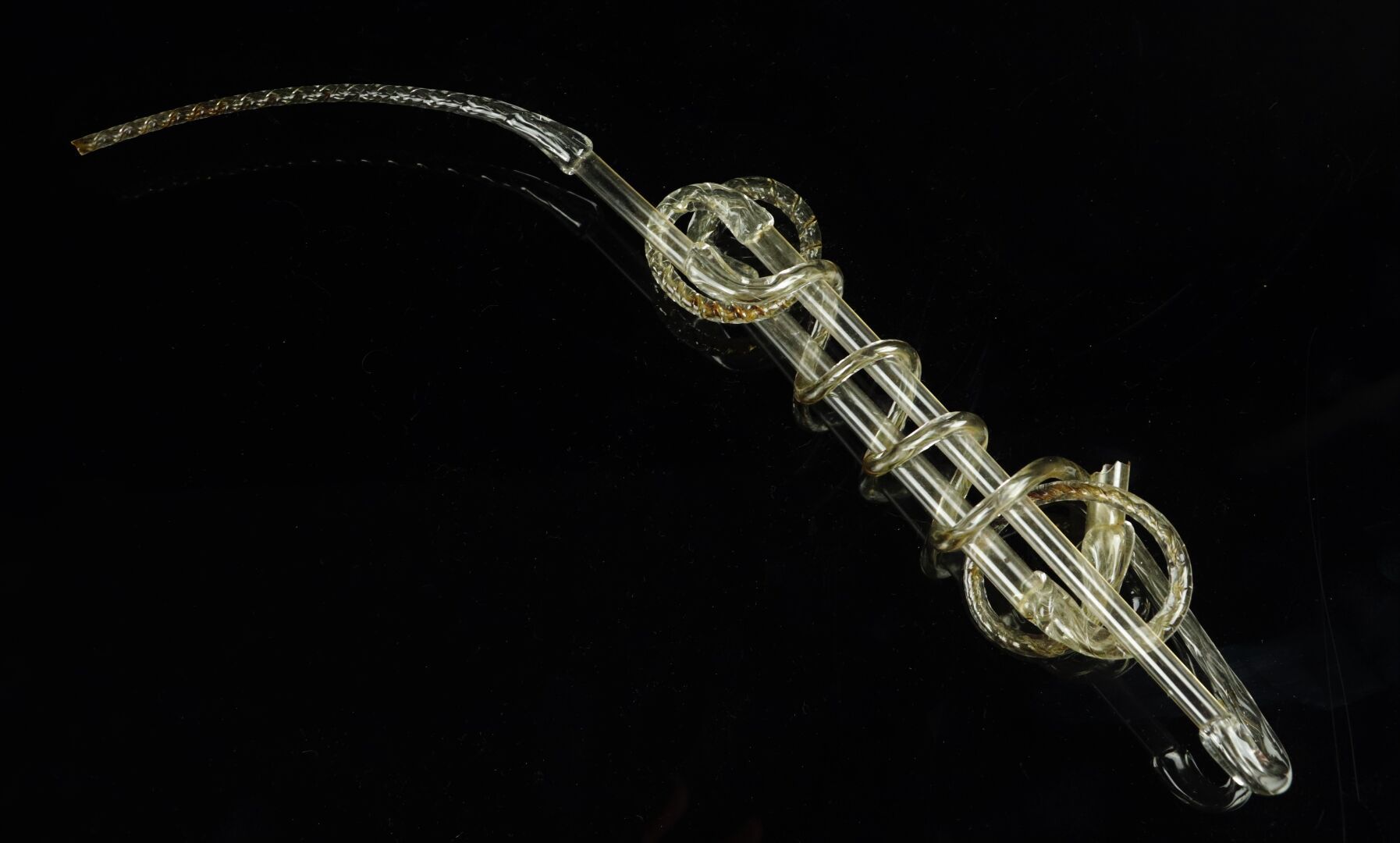 Null Pipe in glass twisted and coiled with heat.

XIXth century.

L_30 cm, missi&hellip;