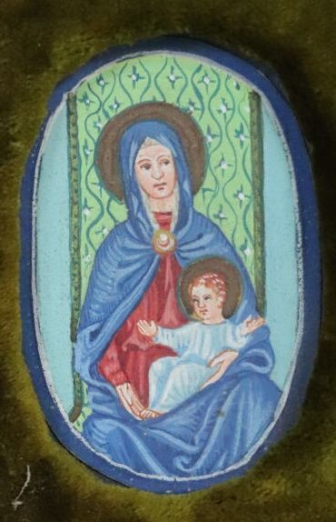 Null Vergine e bambino.

Guazzo in miniatura su carta.

H_5,5 cm W_3,5 cm.

Corn&hellip;