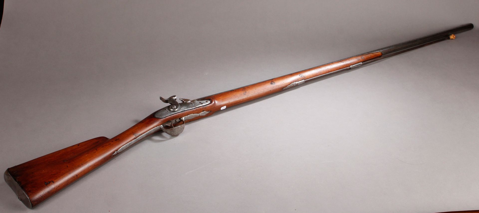 Null Flintlock rifle, converted to percussion. (Wear and tear and cracks).