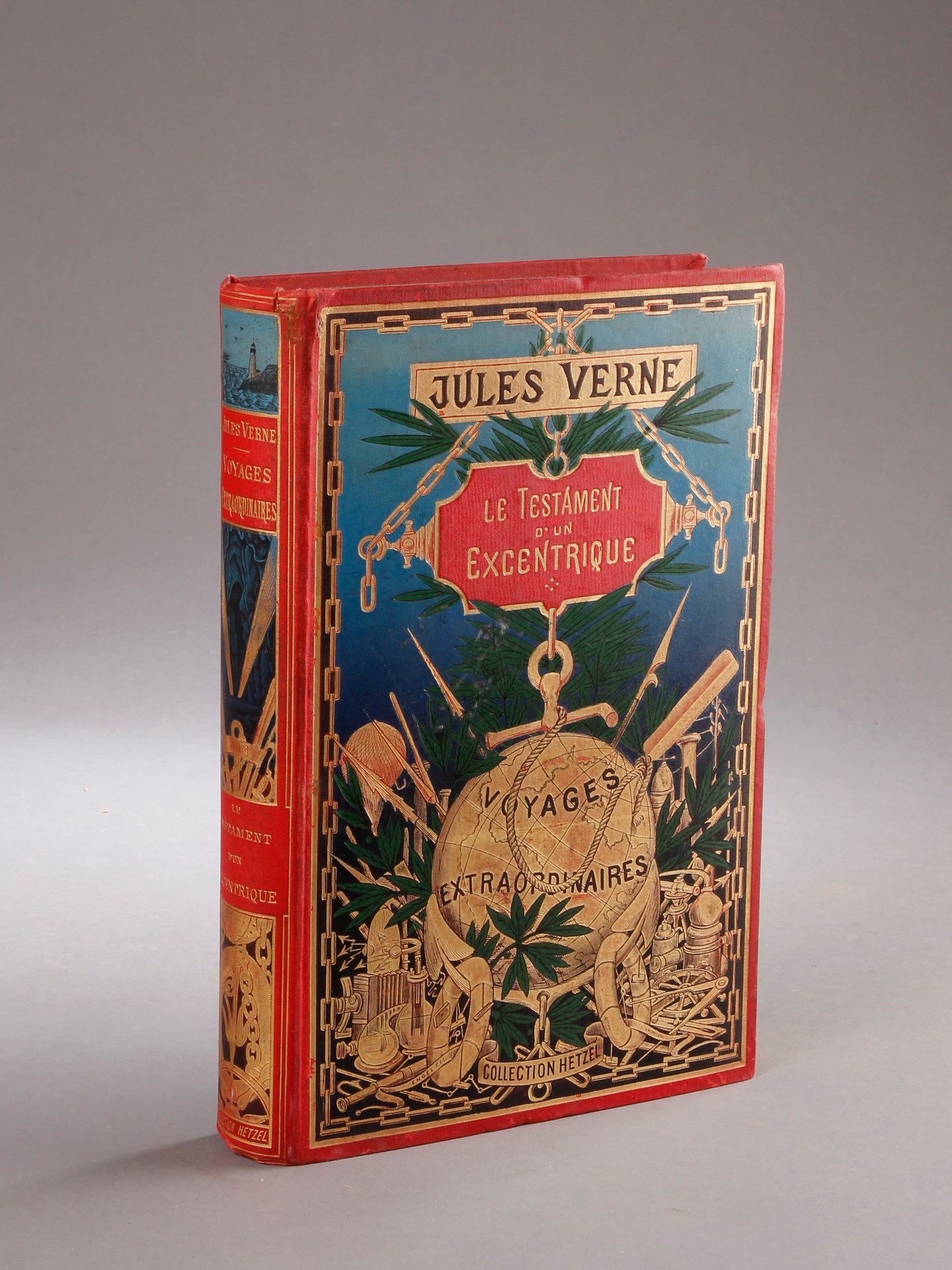 Jules VERNE / HETZEL. Le Testament d'un excentrique（1899年）。多色板上有鎏金地球仪，书脊上有灯塔（3型）&hellip;