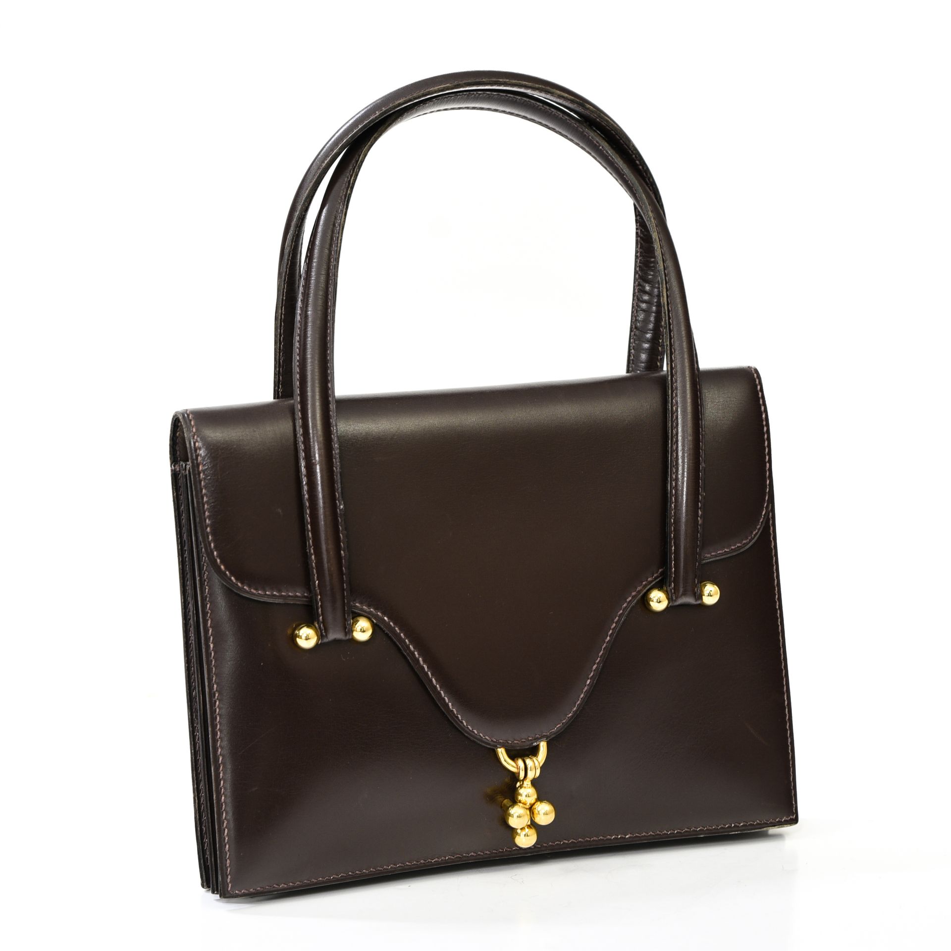 Hermès "Loto" handbag



Brown box leather, gold-plated clasps and fittings, dou&hellip;