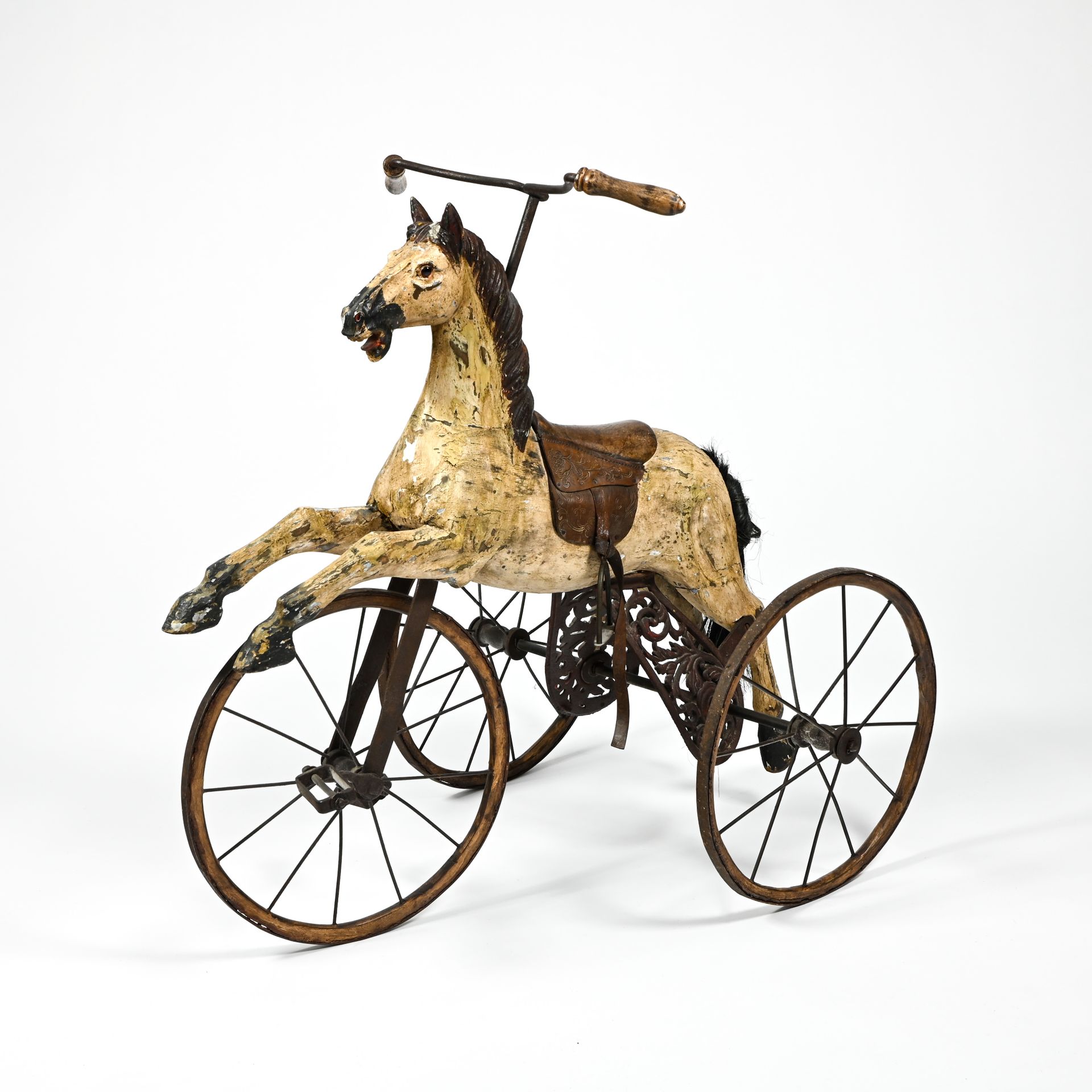 Cheval tricycle Horse tricycle

LATE 19TH CENTURY WORK

Carved polychrome wood, &hellip;