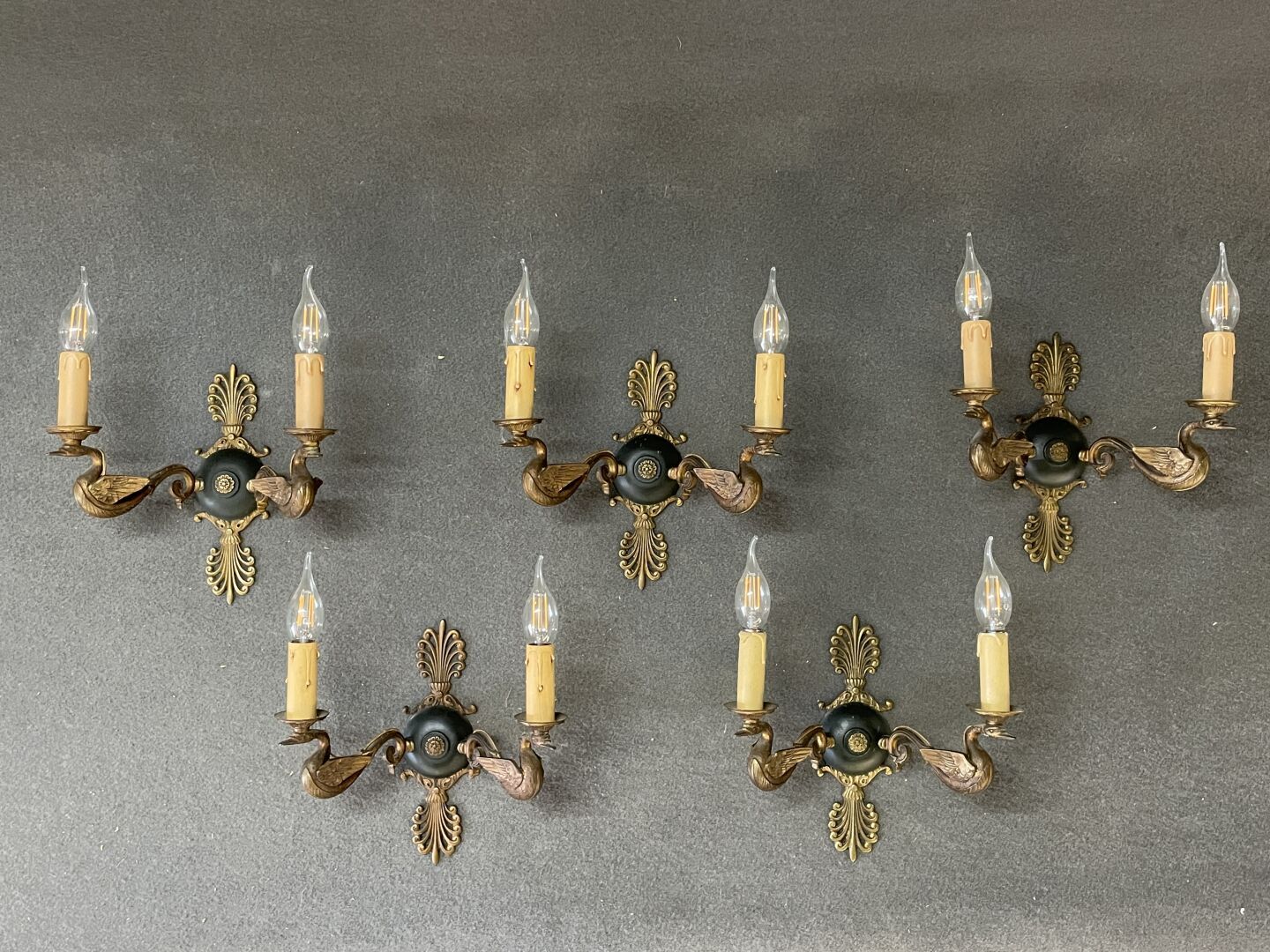 Five ormolu and patinated sconces decorated with swans. 
Empire style. 
34 x 28 &hellip;