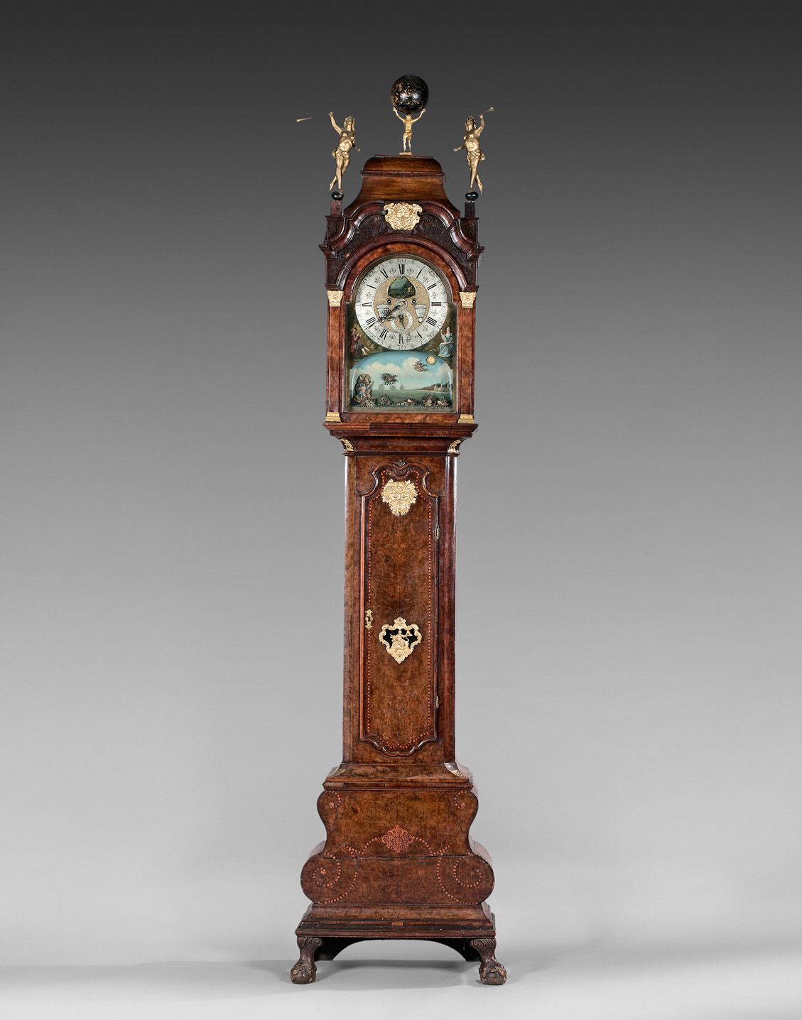 Null Walnut and burr walnut floor clock topped by two statuettes of Renown and a&hellip;