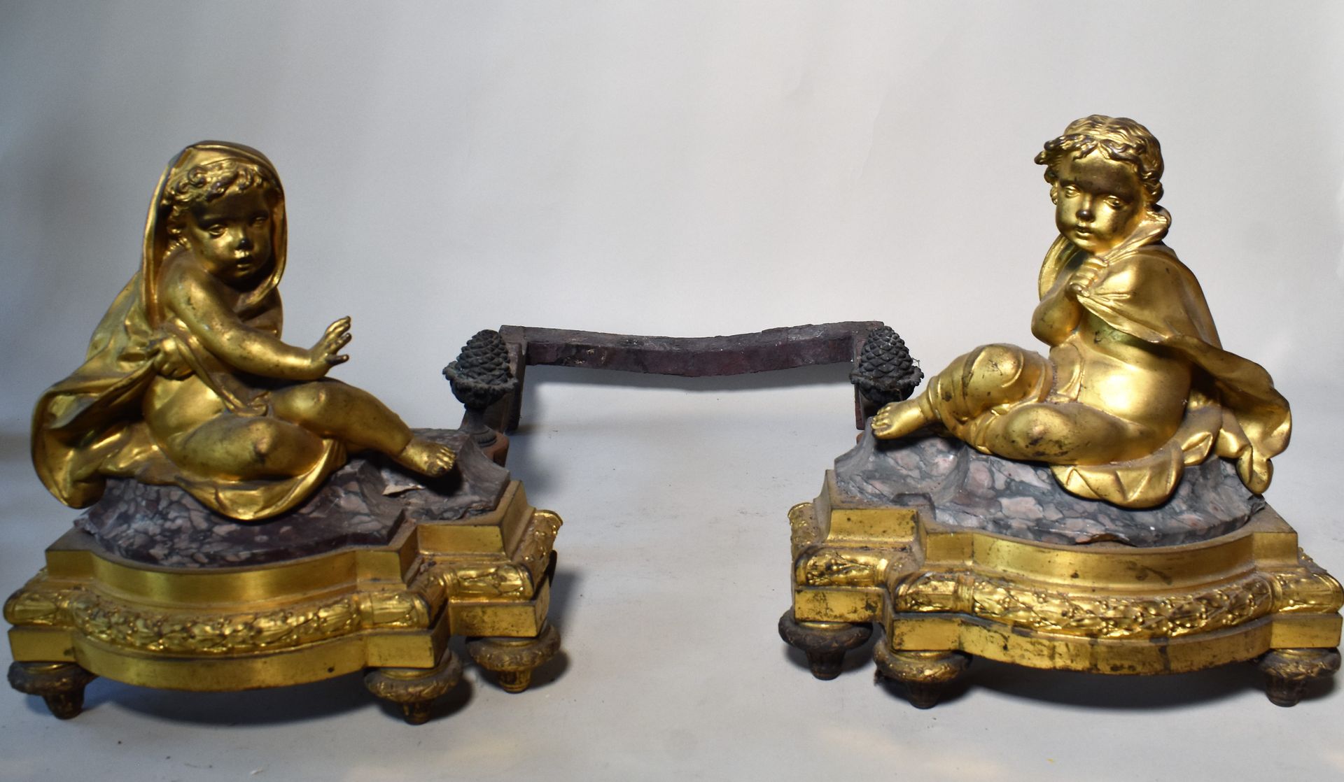 Null Pair of ormolu and griotte marble CHENETS with children warming themselves.&hellip;
