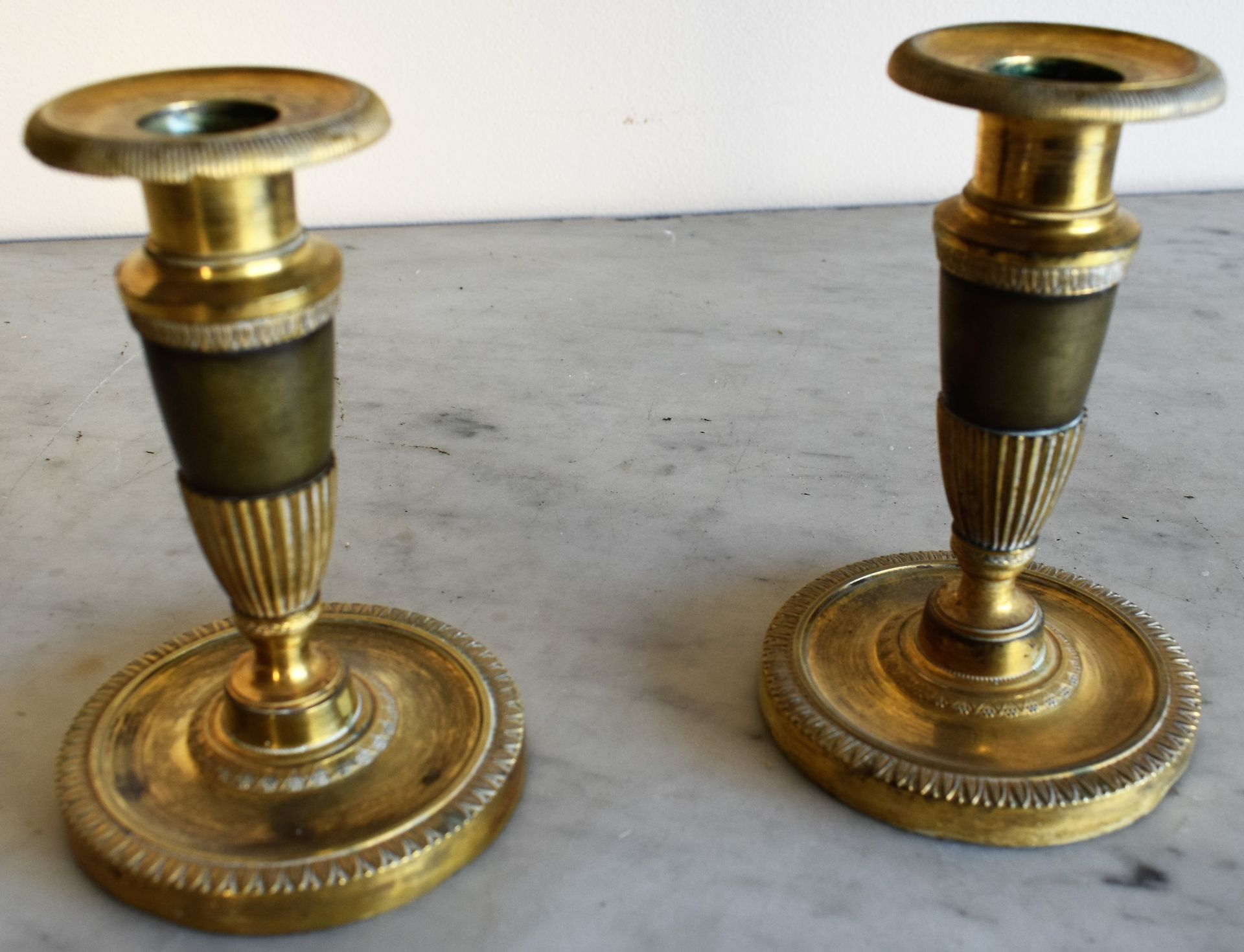 Null 
PAIR OF SMALL CANDLES in bronze with two patinas (small accidents). 19th c&hellip;