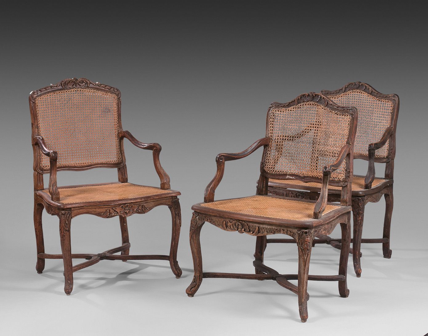 Null THREE CANED CHAIRS, one pair, with flat backs formerly painted, carved with&hellip;