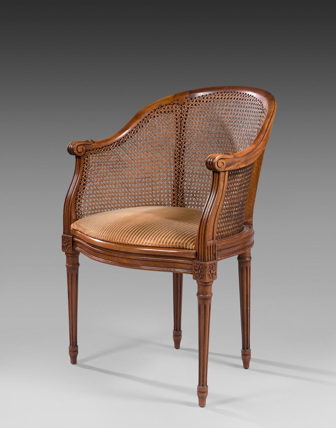 Null Caned desk armchair, in natural wood. Louis XVI style. Height : 86,5 cm