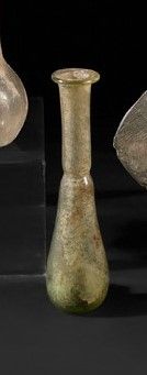Null One balsamaire with high tubular neck.

Colorless glass.

Roman art, 3rd ce&hellip;