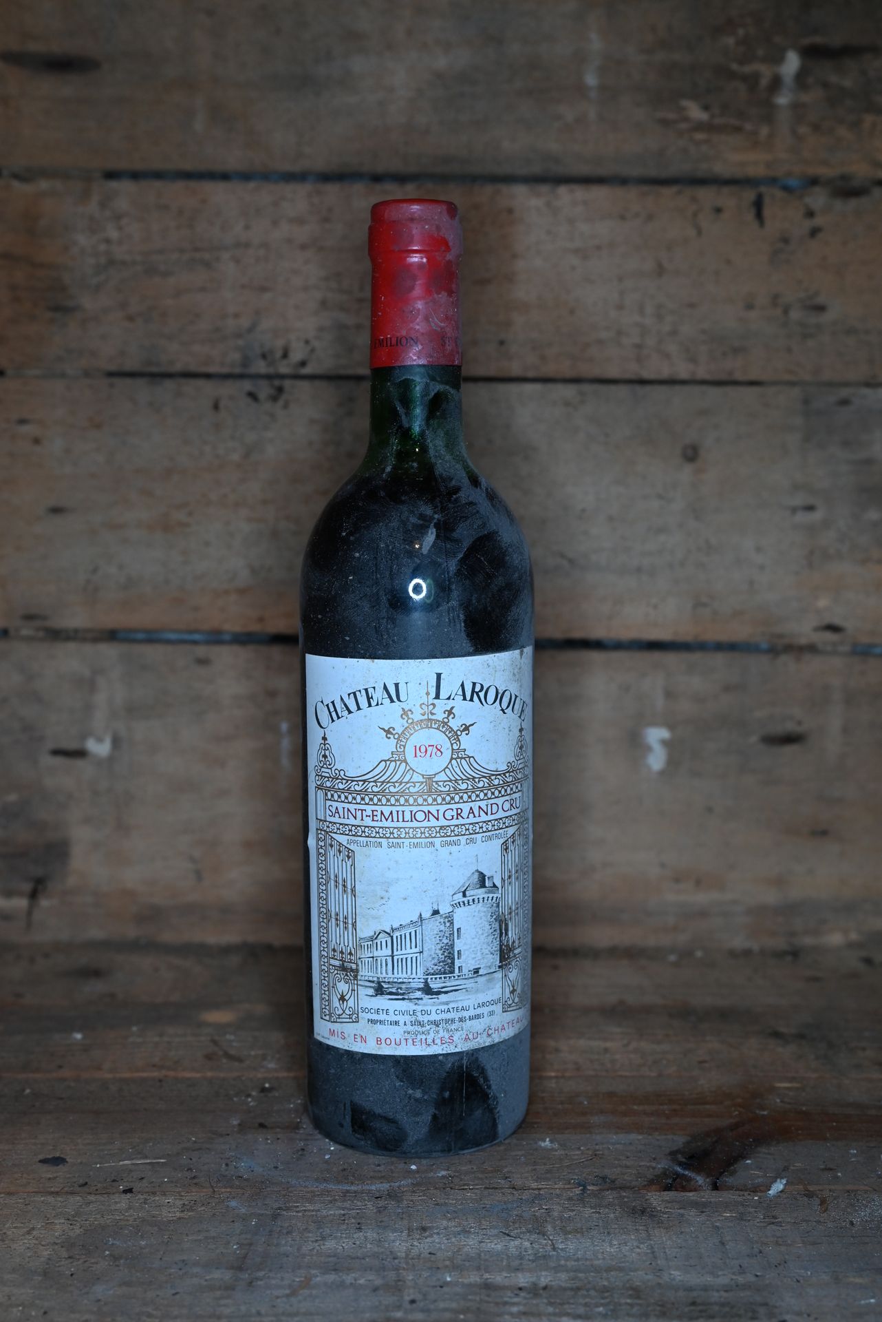Null 11 bottiglie Château Laroque Saint Emilion GC 1978. 

Le condizioni delle e&hellip;
