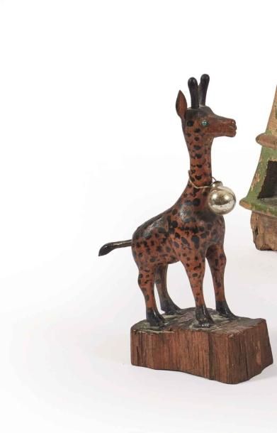 Null Deux jouets figurant un renard et une girafe monoxyles, les yeux rehaussés &hellip;