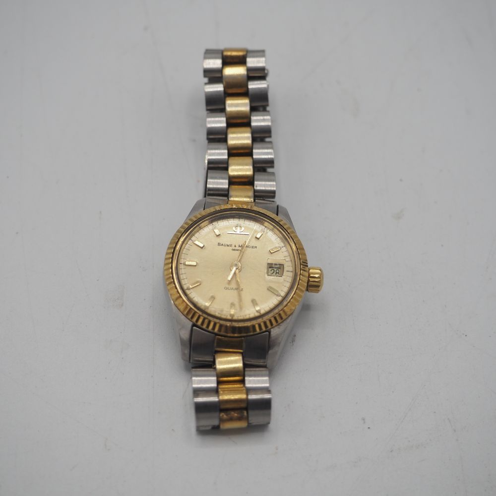 Null Baume & Mercier：女士腕表，约1970年，精钢和黄金，圆形表壳，玑镂式表圈，黄金表盘，石英机芯，日期窗口，指挥棒数字，黄金和精钢表带，带&hellip;