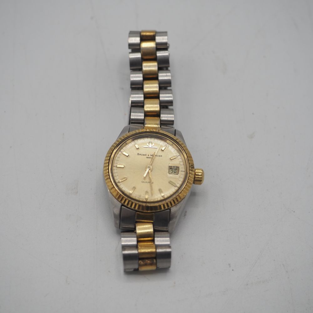 Null Baume & Mercier : Damenuhr um 1970, Stahl und Gold, rundes Gehäuse mit guil&hellip;