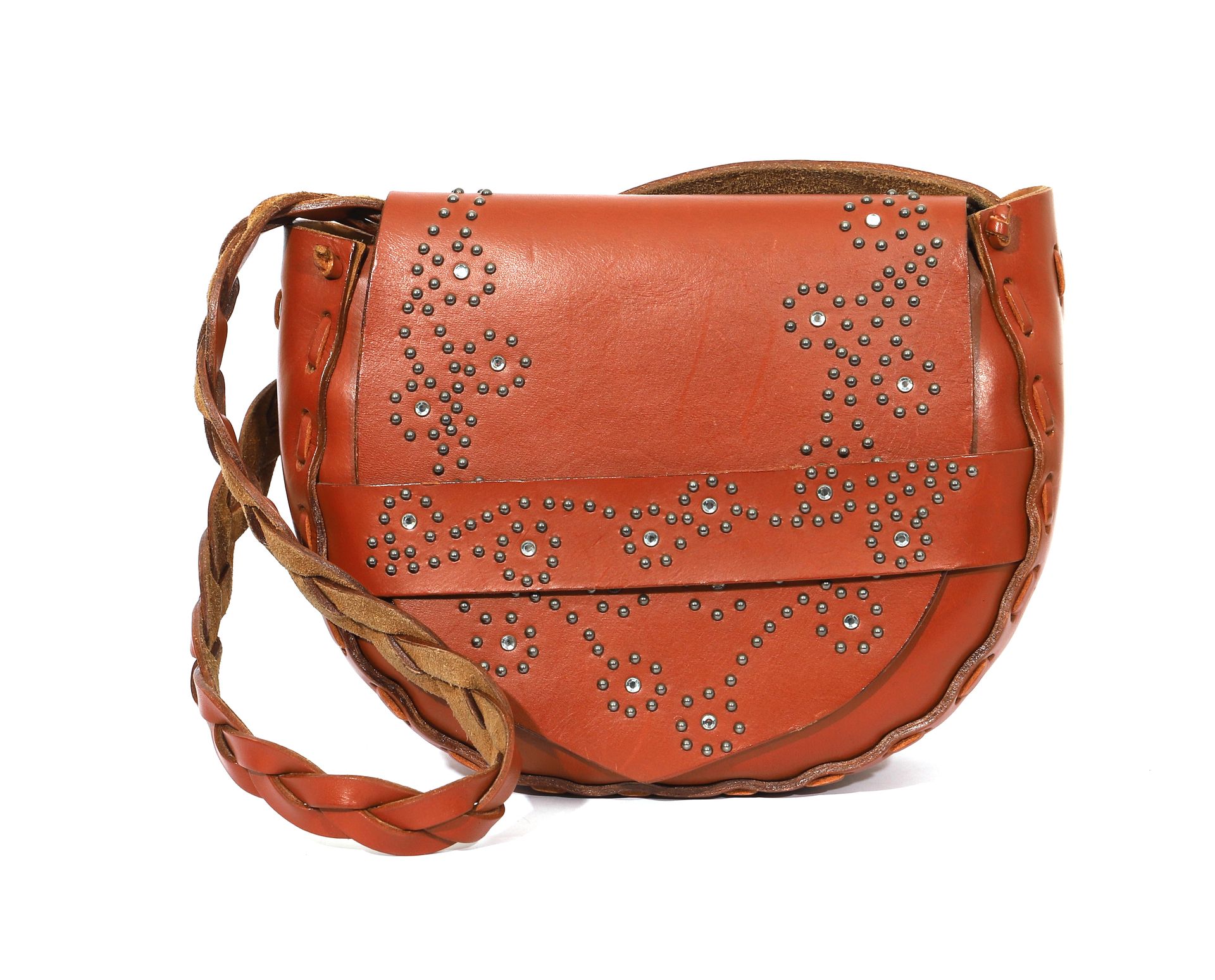 Null Kathleen Madden Bag

Camel leather, studded decoration and braided handle.
&hellip;