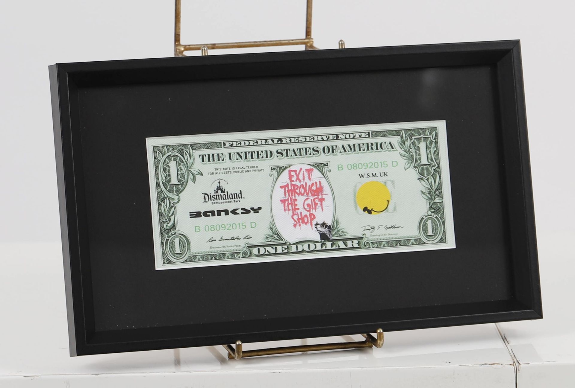Null 班克斯（后）

有框的美国1美元纸币

丝网印刷在画布上，玻璃下有框架。

带框架的尺寸：高：19；宽：32厘米