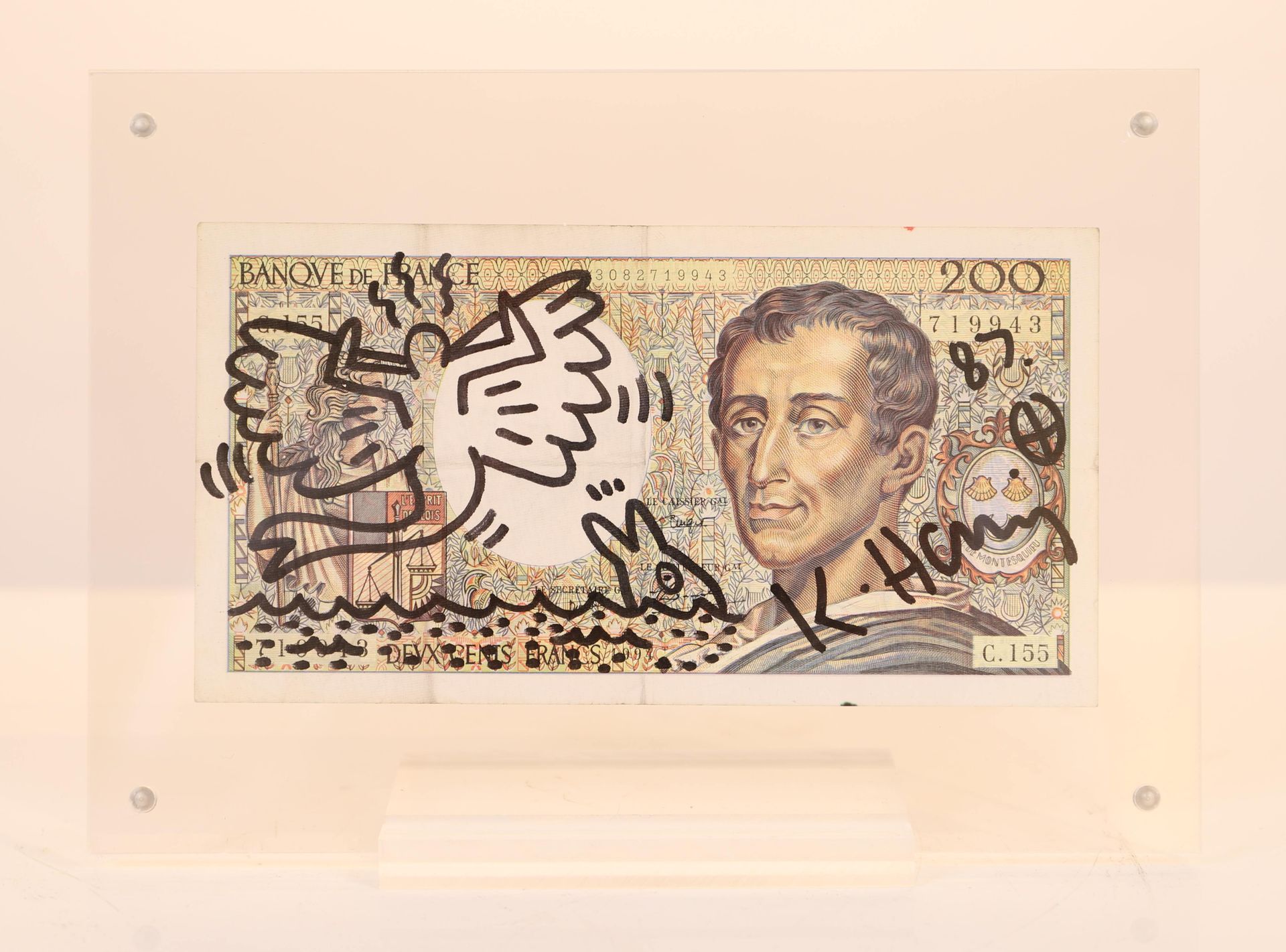Null Keith HARING (1958-1990) Attr.

在一张真正的200法郎纸币上用黑色毡笔画的原画。

右上角有签名和日期87。

作品被&hellip;
