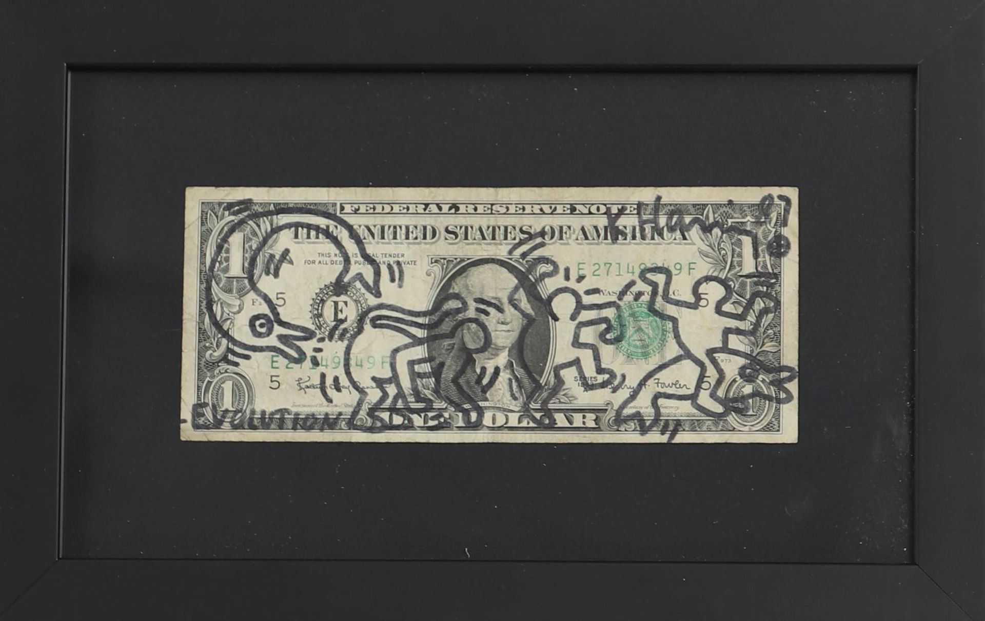 Null Keith HARING (1958-1990) Attr.

在真正的1美元纸币上用黑色毡笔画的原画。"进化"

右上角有签名和日期87。

玻璃下&hellip;