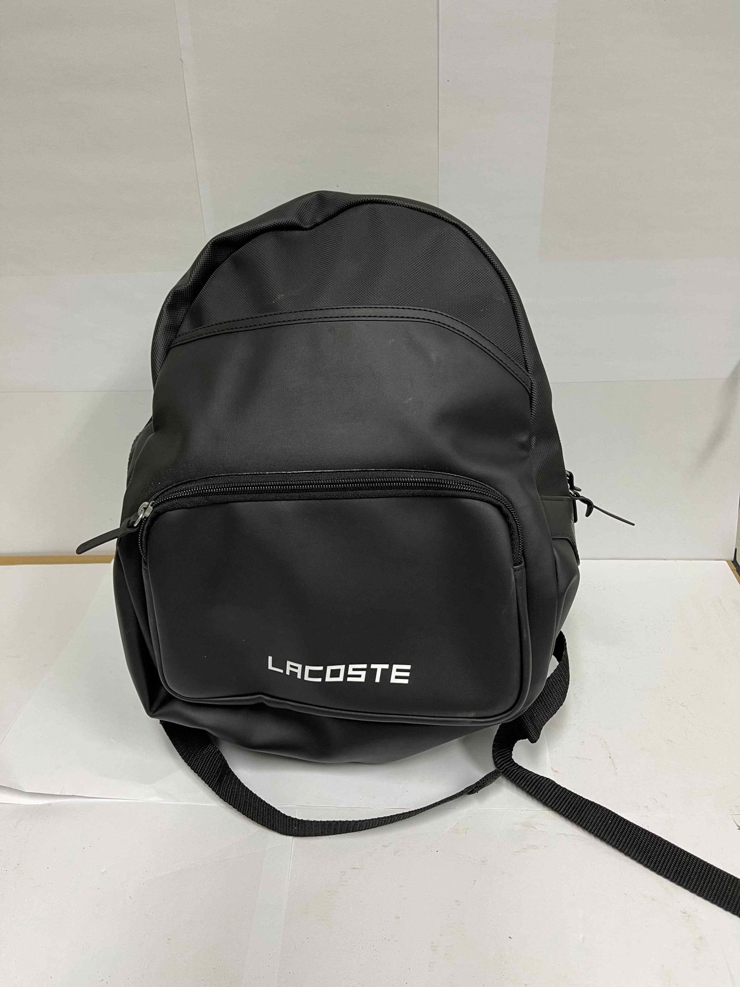 lacoste backpack with dust bag in excellent condition