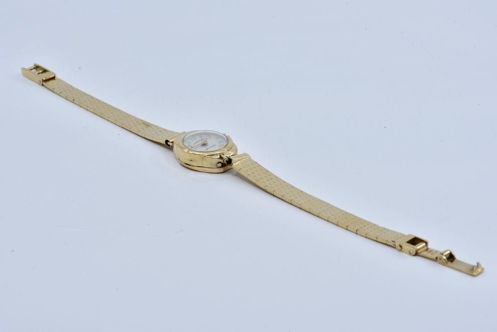 Null 
	Courtoise

Ladies' wristwatch, round case, cream dial with Arabic numeral&hellip;